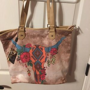 *Sold Montana West steer skull handbag,